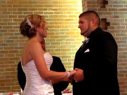Jenny and Mike say their vows to each other at their wedding 08/25/12